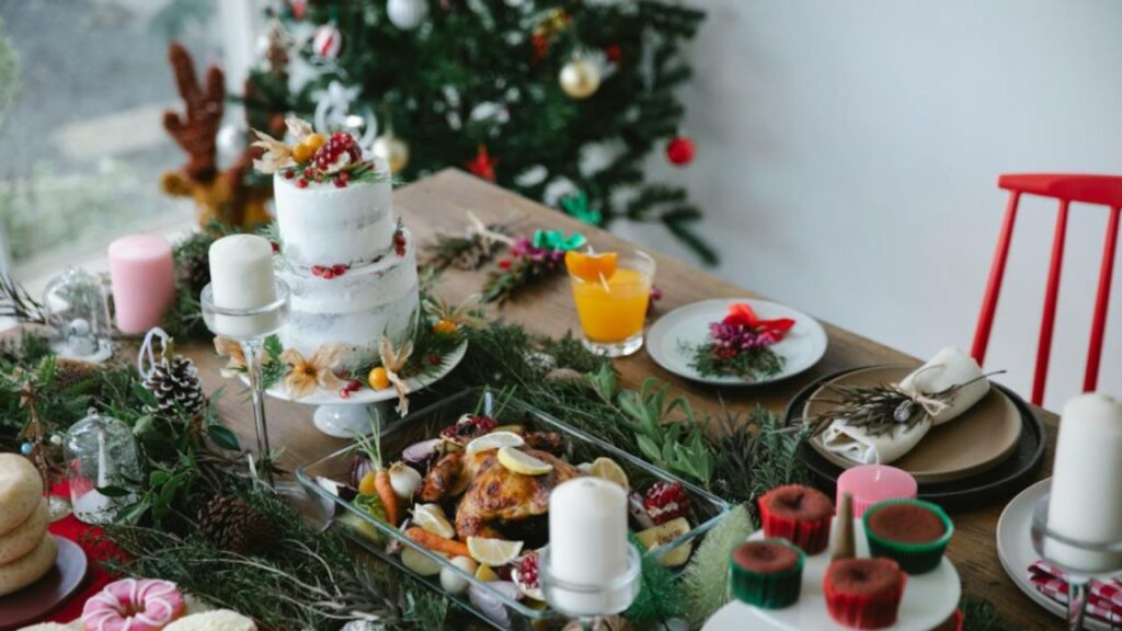 a dining table with many food items ready to eat