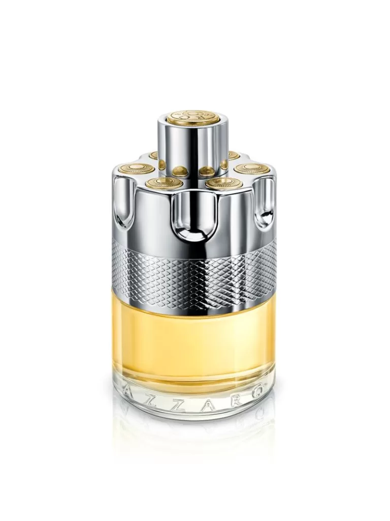 An image of Azzaro Wanted for Men EDT, featuring its unique, gun cylinder-shaped bottle in bright gold color. 