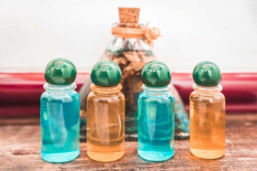 An image of different small perfume bottles