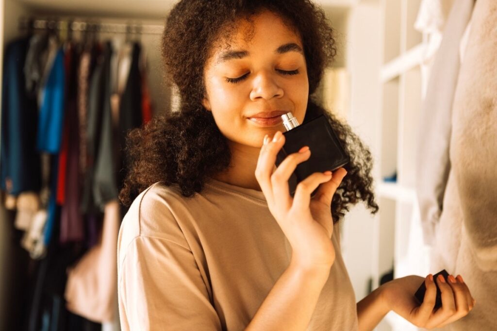 An image of a girl with perfume