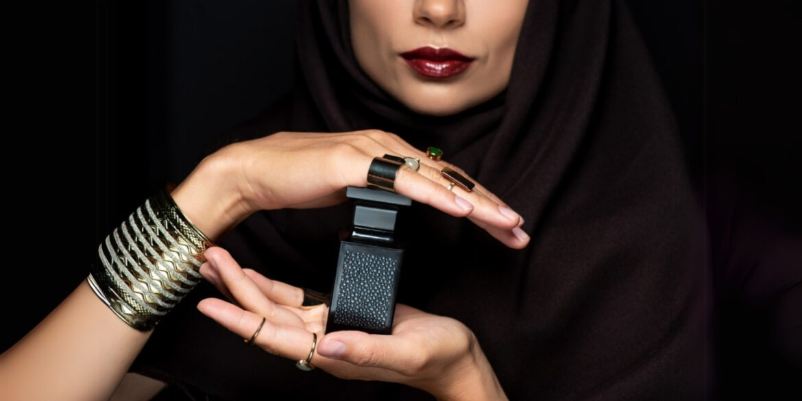 best-perfumes-for-eid An image of an arab lady with a perfume in her hands as display