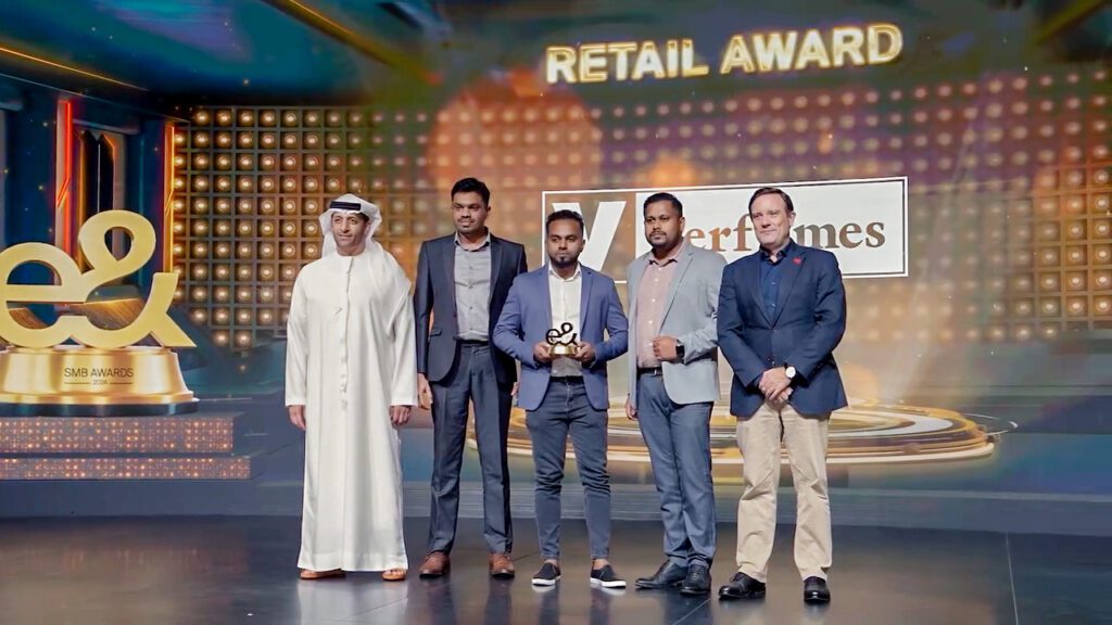 V Perfumes Triumphs as Best Retailer at Etisalat SMB Awards 18 An image of V Perfumes receiving the Best retailer award by Etisalat