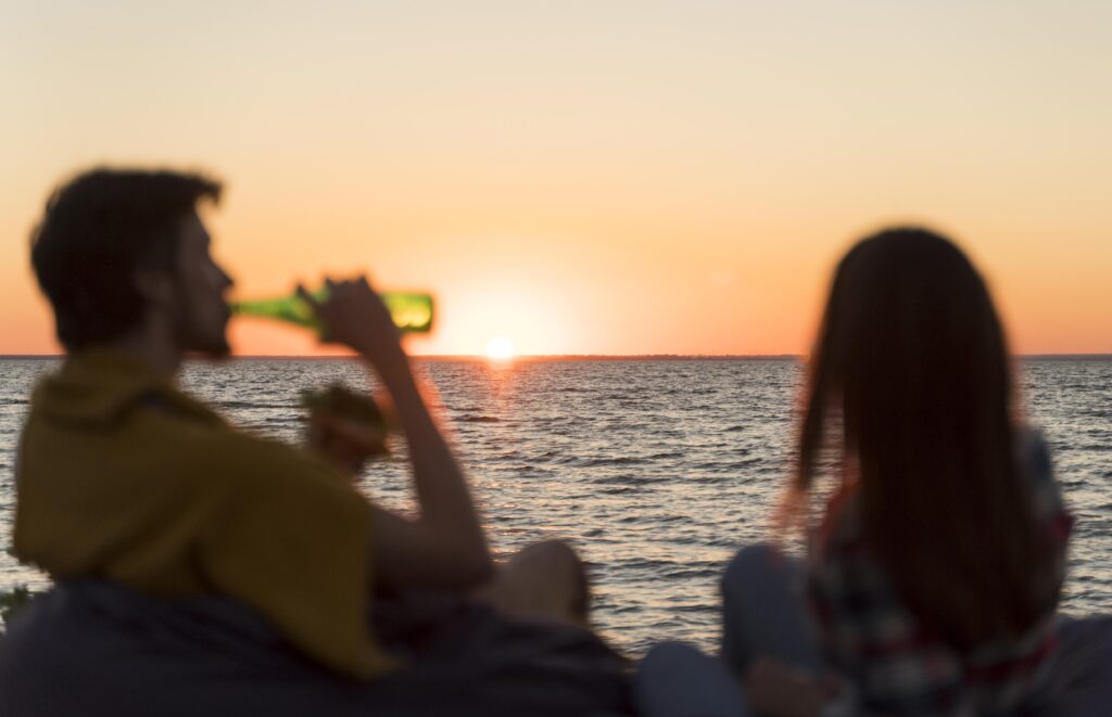 An image of a couple having sunset dinner 