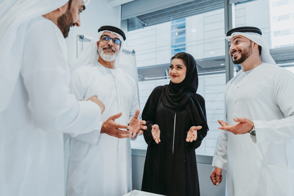 An image of a group of corporate people wishing eid mubarak 
