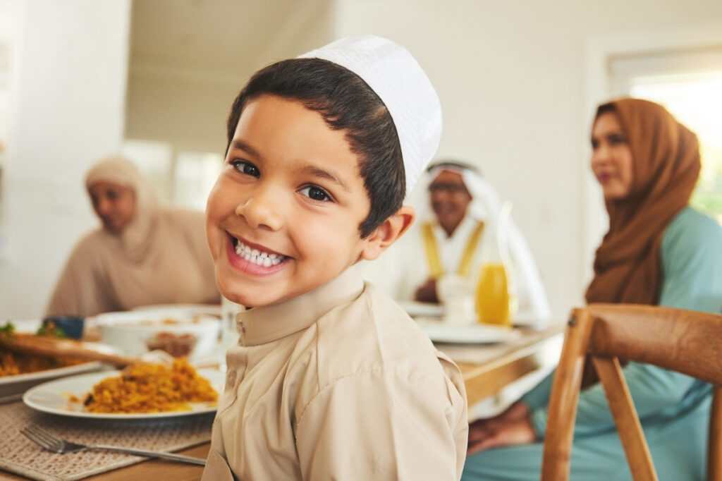 An image of a kid during eid celebration.