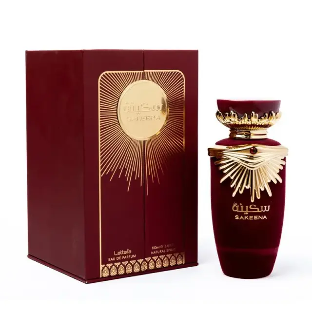 An image of Lattafa Sakeena perfume with its bottle in red color.