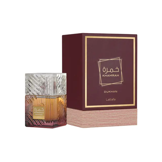 Isang imahe ng Lattafa Khamrah dukhan perfume kasama ang kahon nito