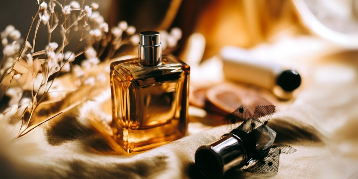 An image of aromatic perfume with similar elements in the background