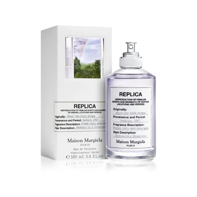 An image of Maison margiela replica when the rain stops EDT perfume with its box