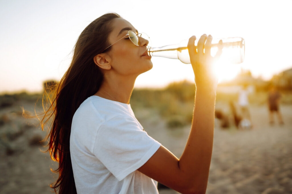 An image of a woman drinking water