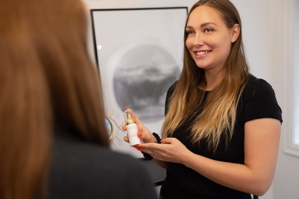 An image of a woman with perfume