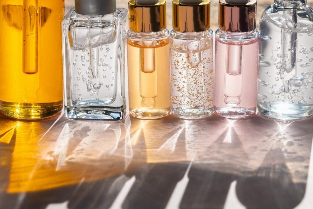 An image of different perfume oil bottles