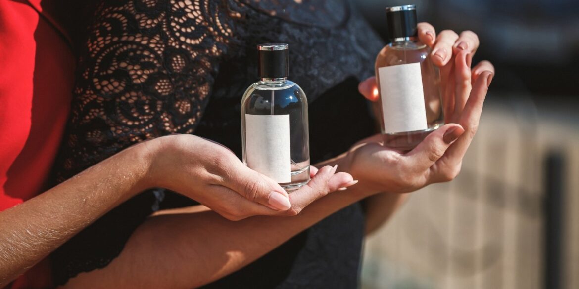 An image of 2 persons with perfumes that matches together