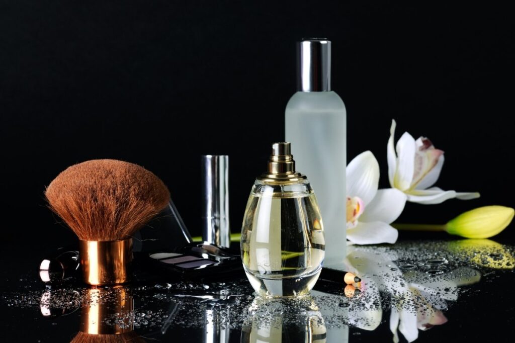 Fragrance in Skincare - Should you be Concerned? 18 An image of perfume with a set of grooming products