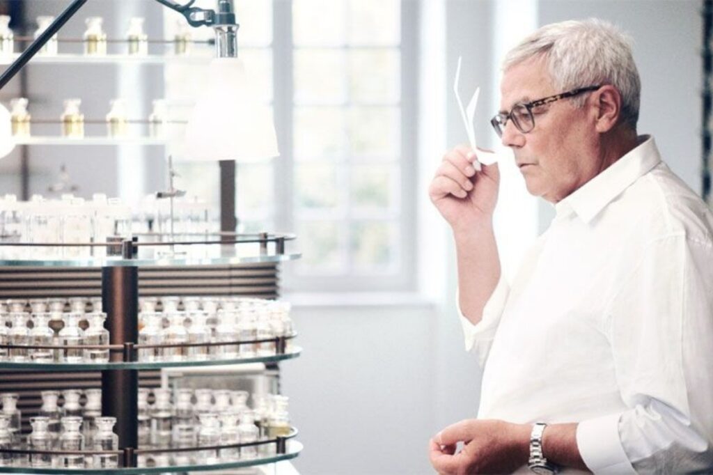 Perfumer of the Day: François Demachy 18 An image of the perfumer Francois demachy testing out a perfume