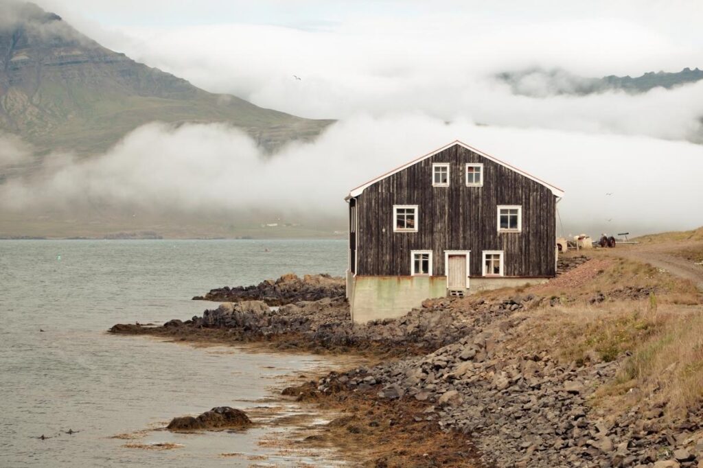 A Blind Sniff Test - Do you know your fragrances? 20 An image of a black wooden house along the valleys