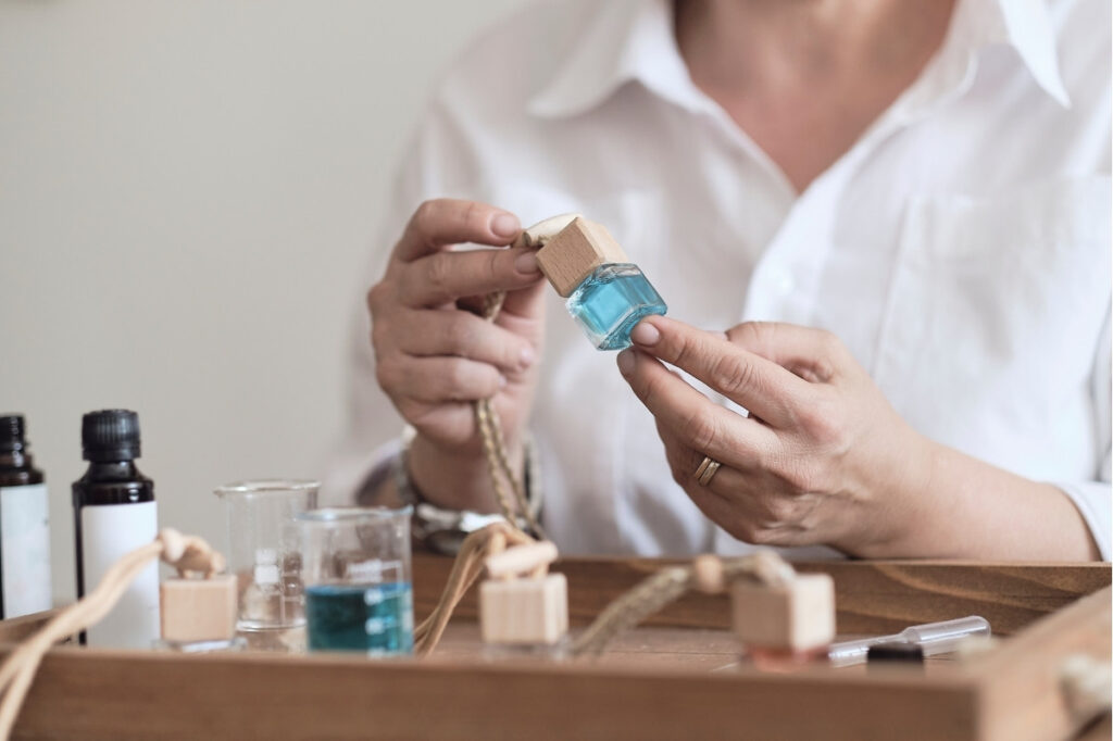 Can You Create the Perfect Scent? A Perfume Creation Game! 20 An image of a woman making perfume