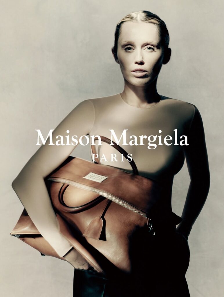 An image of miley cyrus in an advertisement of Maison Margiela                                                                                                                       