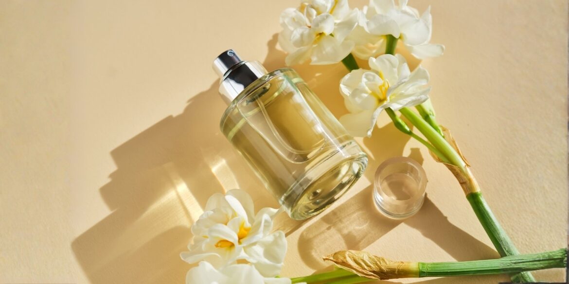 perfume-on-a-beige-background-with-tuberose An image of a perfume with tuberose flower