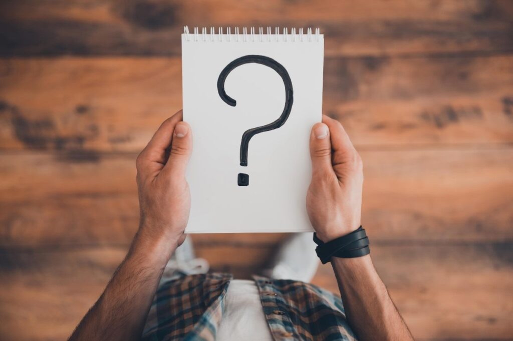 An image of a question mark on a white paper