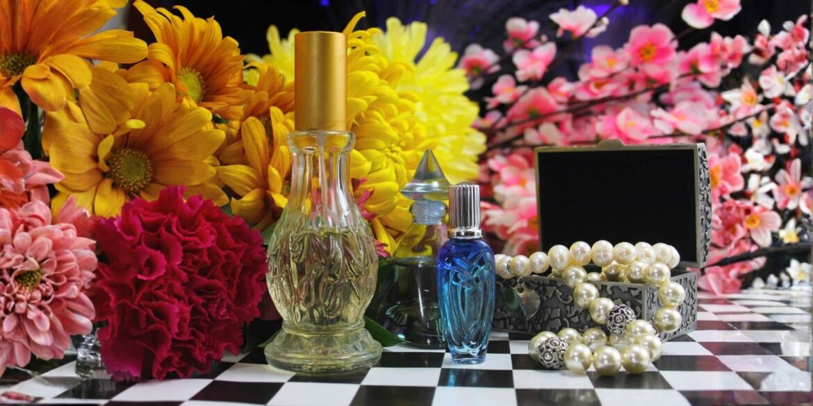 a set of perfumes kept with flowers