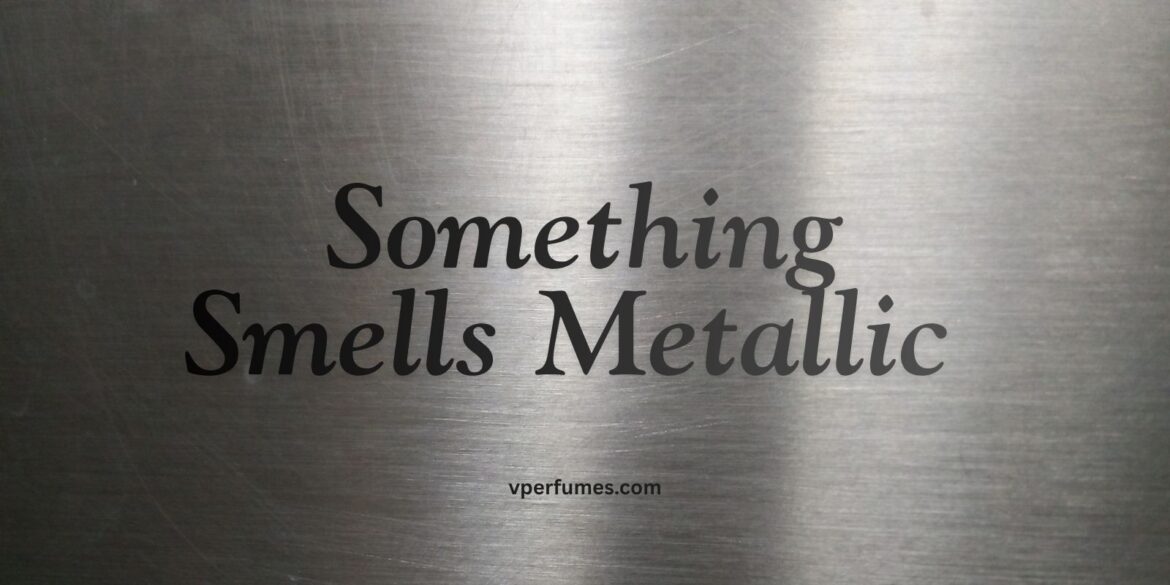 An image of a metal surface in which the text "something smells metallic" is written