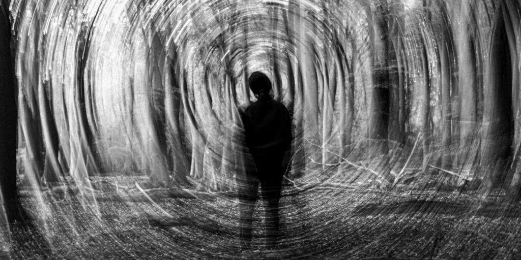 An image of a man in a mysterious place