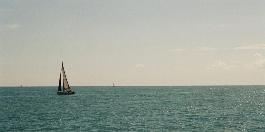 Image of sea with small boats
